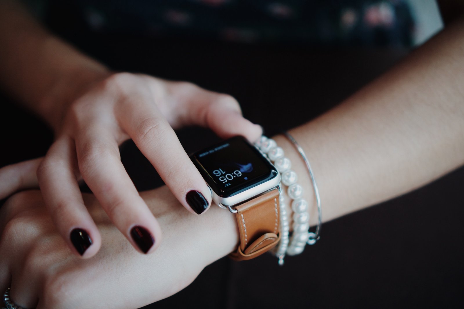 Woman using Apple iwatch smart watch